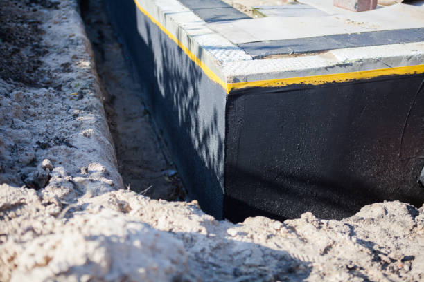 Professional Emergency Waterproofing technician working in Bourneville, OH
